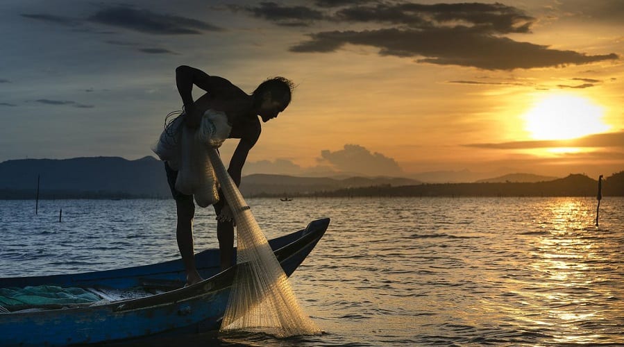 a fisherman with a net
