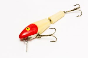 Antique fishing lure after being touched-up