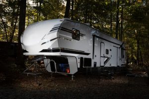 Fifth wheel trailer parked at campground